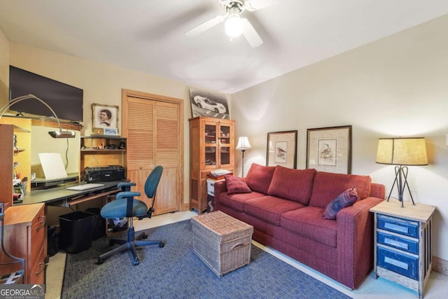 office with light colored carpet and ceiling fan