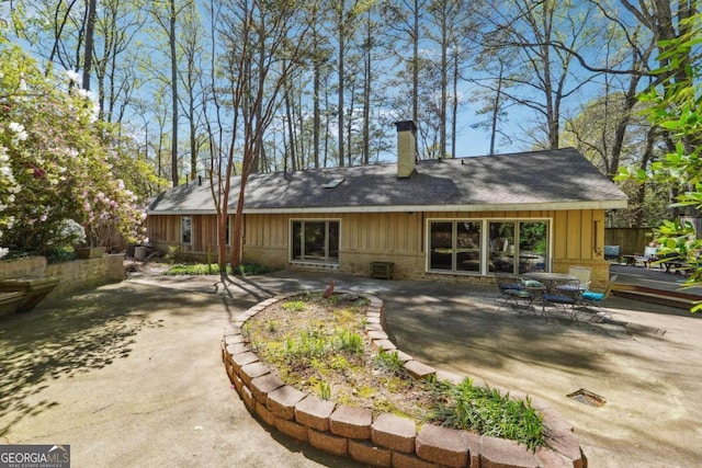 rear view of house featuring a patio