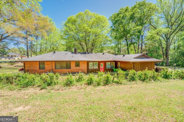 view of front of home with a front yard