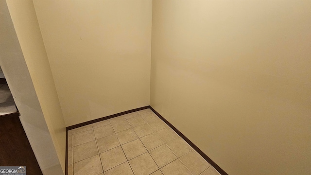 empty room with tile floors