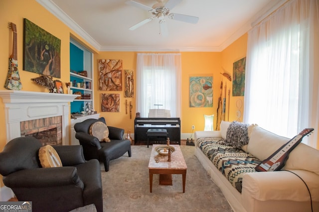 living room with ceiling fan, ornamental molding, and a fireplace