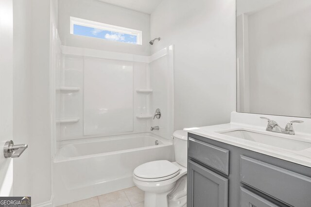 full bathroom featuring tile patterned flooring, vanity, toilet, and tub / shower combination