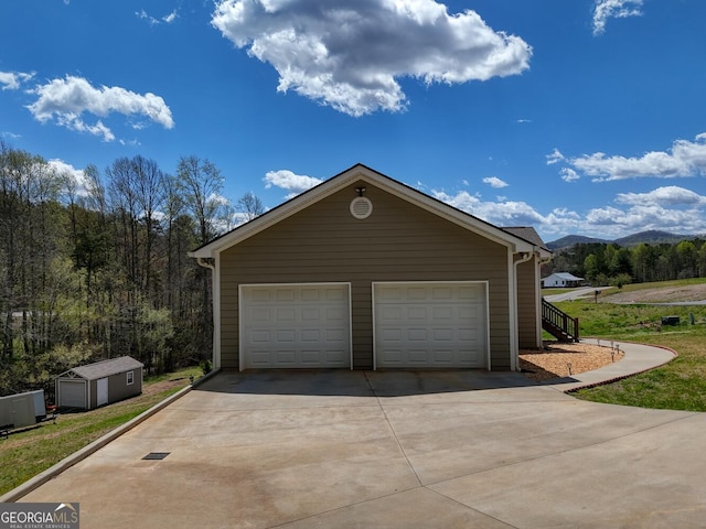 garage featuring a mountain view