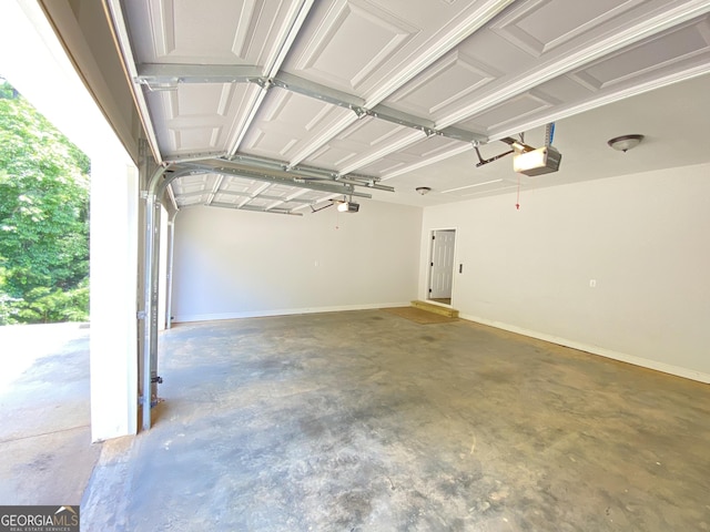 garage featuring a garage door opener