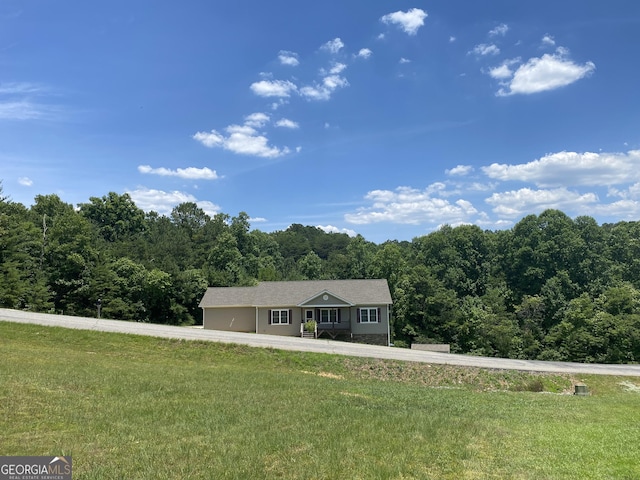 single story home with a front yard