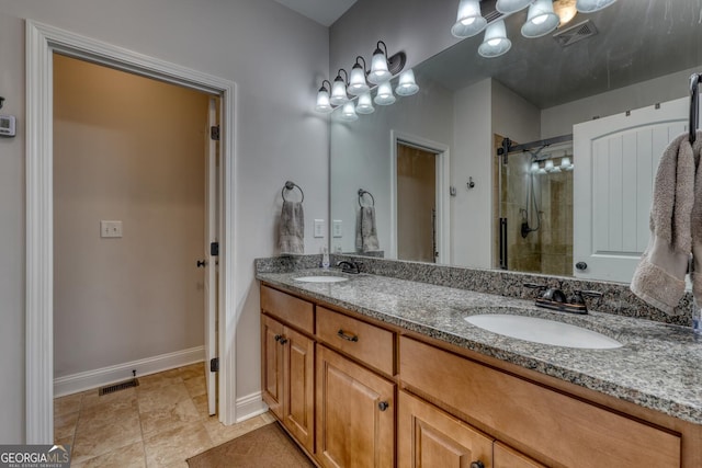 bathroom featuring walk in shower and vanity