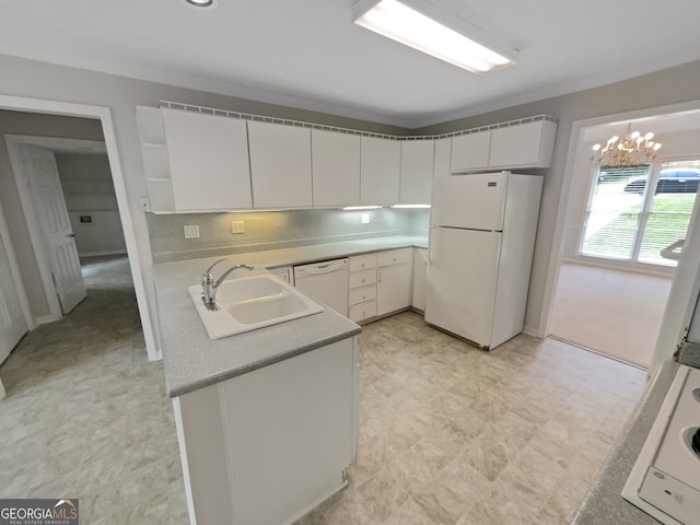 kitchen with sink, white appliances, tasteful backsplash, white cabinetry, and light tile flooring