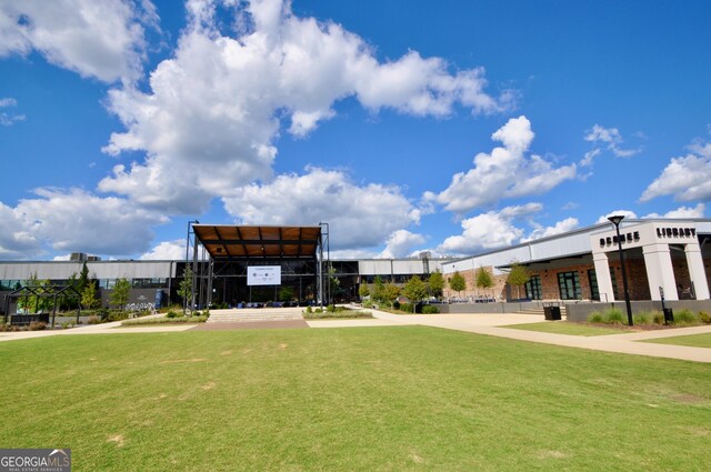 view of community featuring a yard