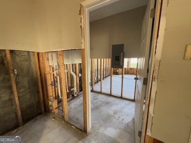 carpeted spare room featuring ceiling fan and a textured ceiling