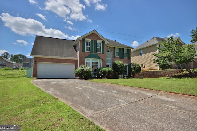 view of front facade featuring a front yard and a garage