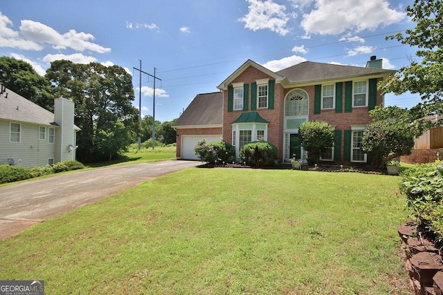 colonial-style house featuring a front lawn