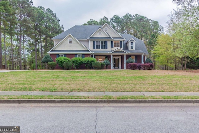 craftsman house with a front yard