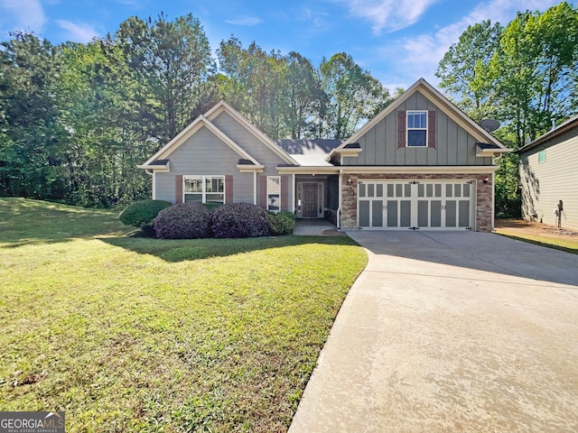 craftsman-style home with a front lawn and a garage