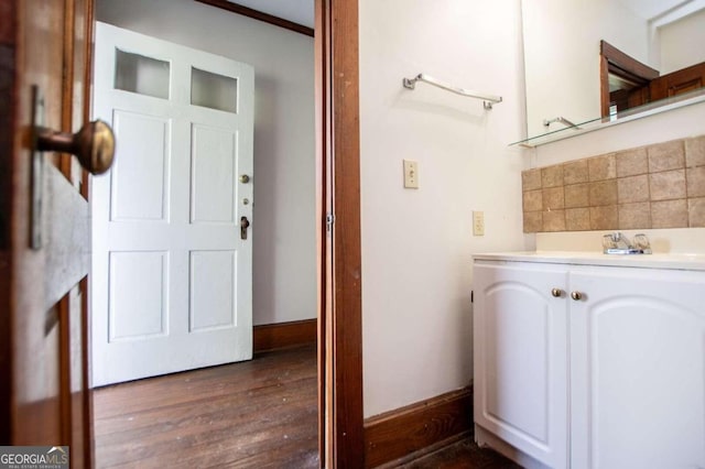 315 Dixie St, Carrollton, GA 30117 - bathroom with wood finished floors and vanity