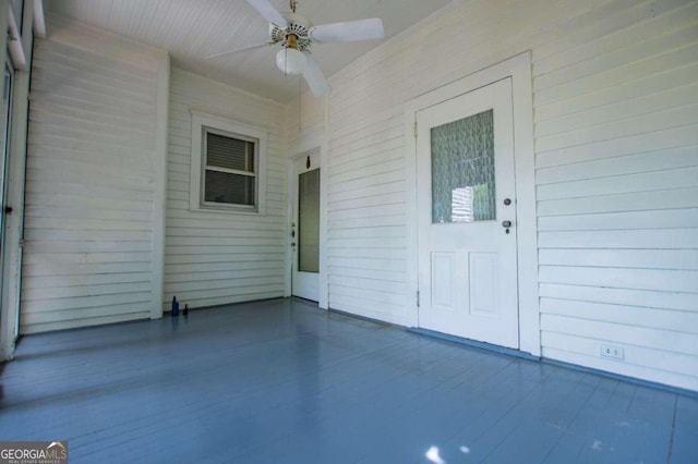 view of patio featuring ceiling fan