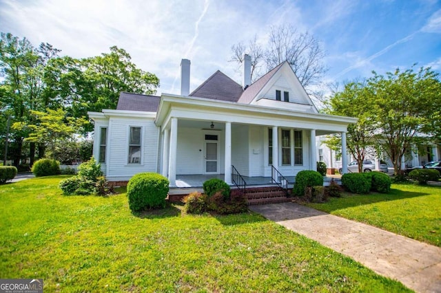 315 Dixie St, Carrollton, GA 30117 - view of front of home featuring a porch and a front lawn