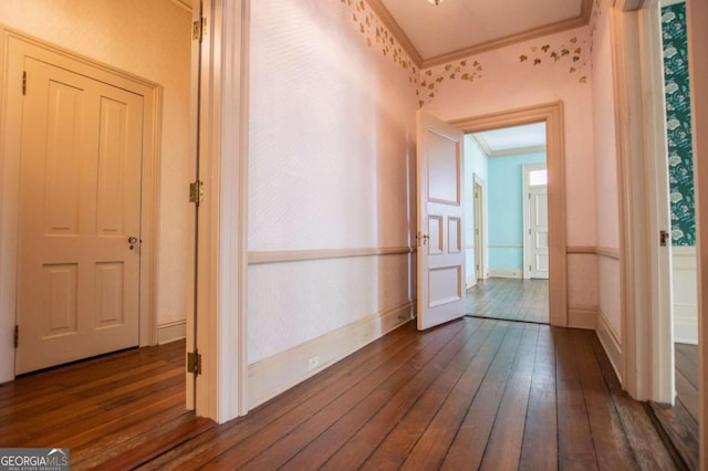 315 Dixie St, Carrollton, GA 30117 - corridor with dark wood-type flooring, baseboards, and crown molding