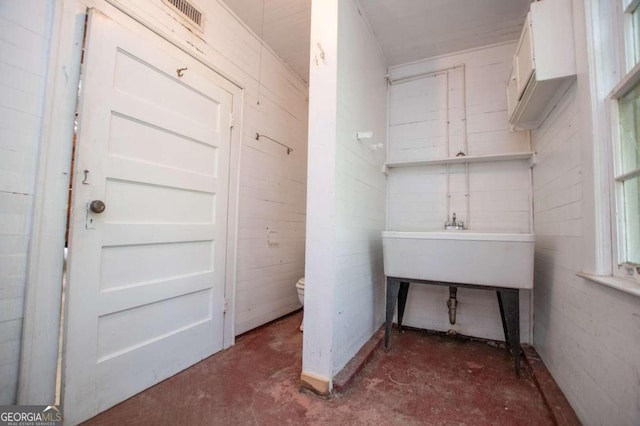 315 Dixie St, Carrollton, GA 30117 - interior space featuring toilet, visible vents, and unfinished concrete floors