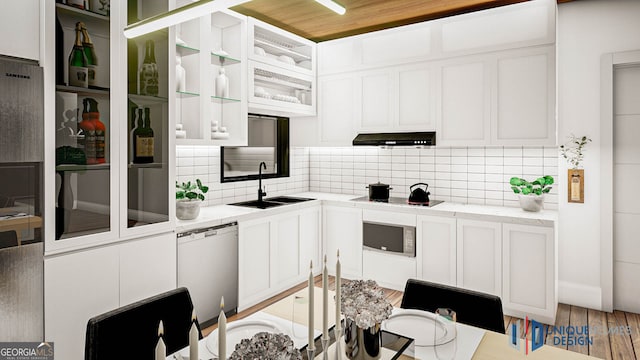 kitchen with white cabinets, sink, backsplash, dishwashing machine, and light hardwood / wood-style flooring