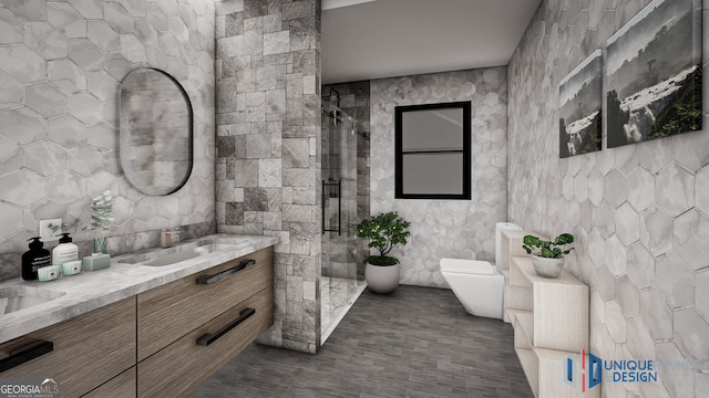 bathroom featuring a shower, toilet, double vanity, and tile walls