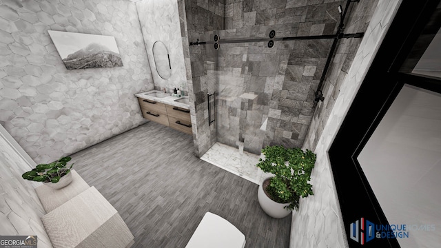 bathroom featuring toilet, vanity, and a tile shower