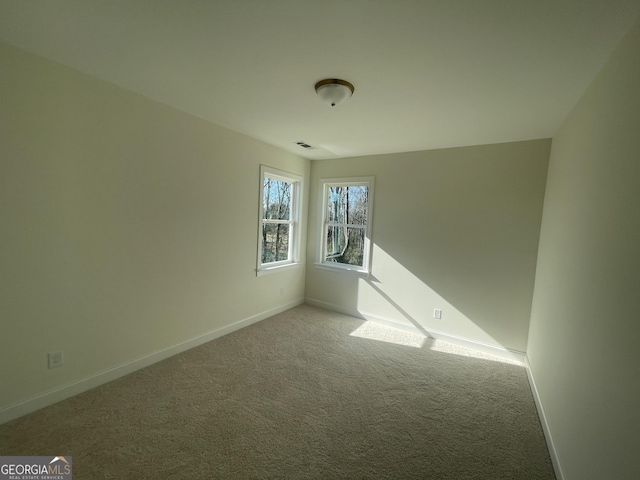 view of carpeted spare room