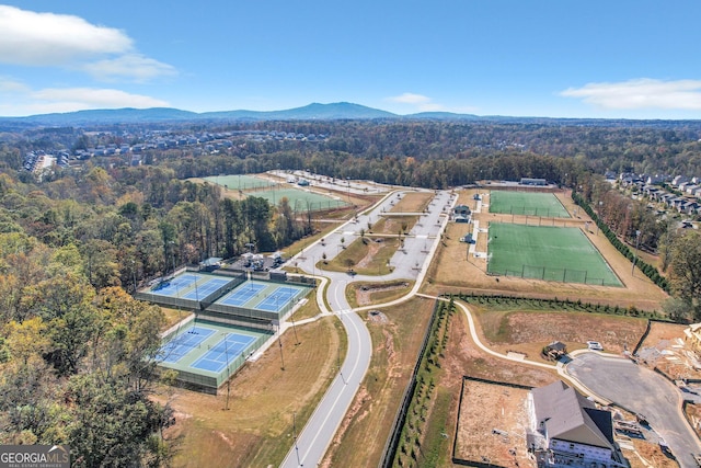 birds eye view of property featuring a mountain view