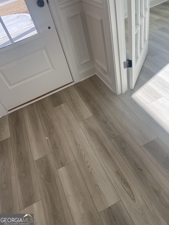 interior details with hardwood / wood-style flooring