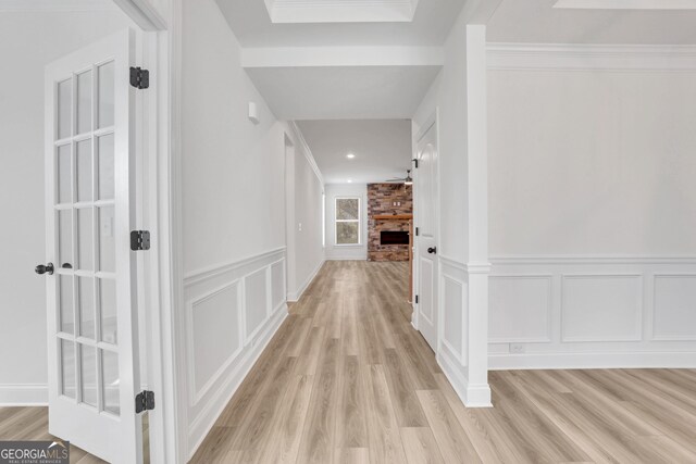 unfurnished dining area featuring a notable chandelier, dark hardwood / wood-style floors, and a raised ceiling