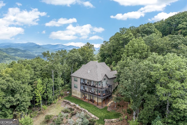 drone / aerial view featuring a mountain view