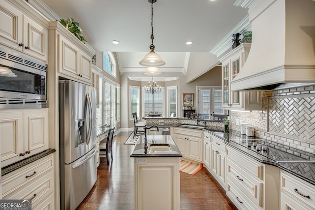 kitchen featuring custom exhaust hood, crown molding, dark wood-type flooring, stainless steel appliances, and vaulted ceiling