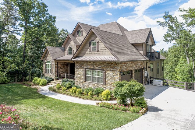 view of front facade featuring a garage and a front lawn