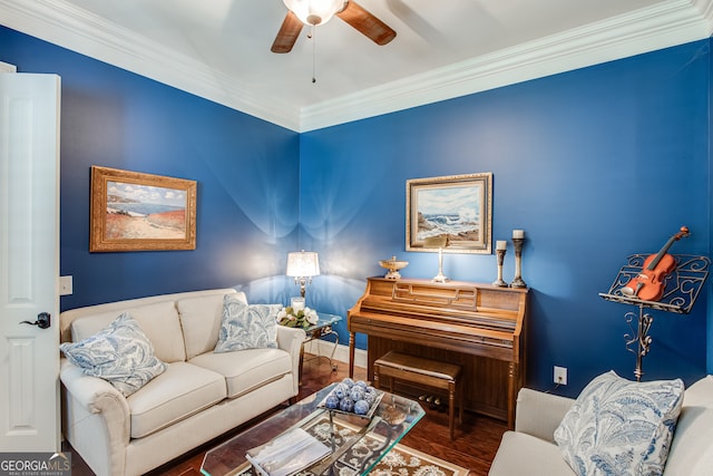 living room with ceiling fan, crown molding, and dark hardwood / wood-style floors