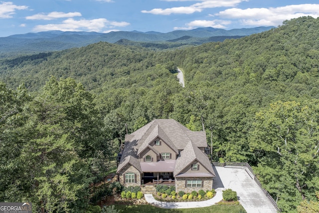 drone / aerial view featuring a mountain view