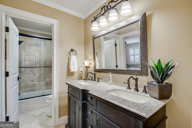 full bathroom with tile floors, dual vanity, ornamental molding, combined bath / shower with glass door, and toilet