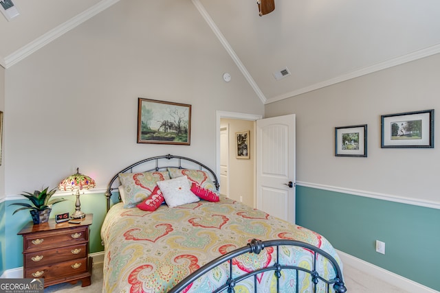 bedroom with ceiling fan, carpet floors, vaulted ceiling, and crown molding