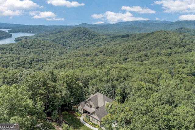 bird's eye view with a water and mountain view