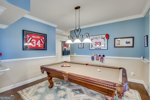 rec room featuring dark hardwood / wood-style floors, pool table, and ornamental molding