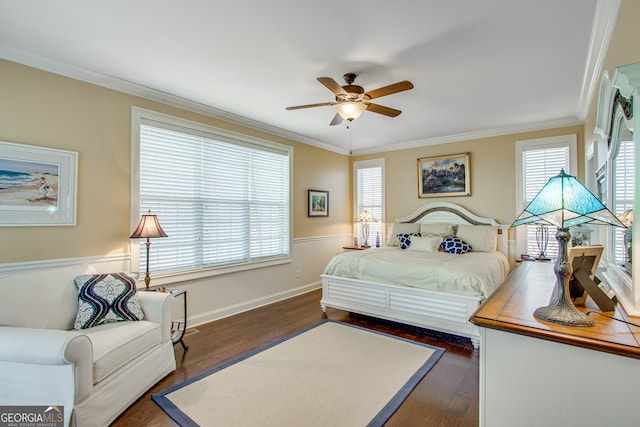 bedroom featuring ornamental molding, ceiling fan, and dark hardwood / wood-style floors