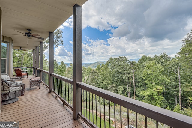 wooden deck with ceiling fan