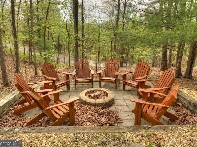 view of terrace featuring a fire pit