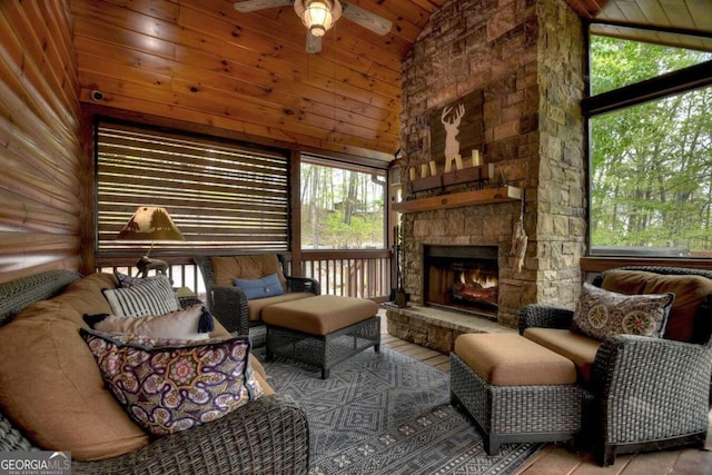 living room with high vaulted ceiling, ceiling fan, a fireplace, and wood ceiling