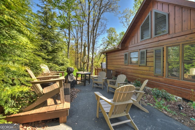 view of patio / terrace featuring a fire pit