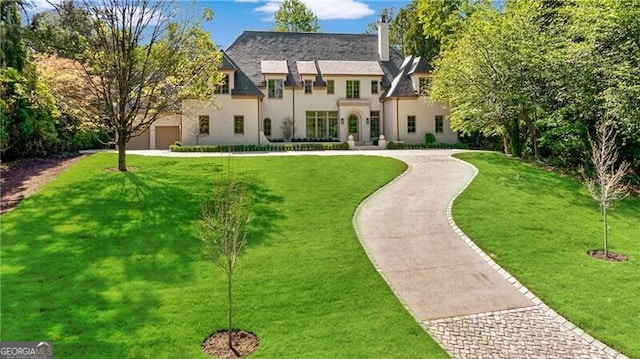 view of front of home with a front lawn