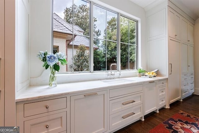 bathroom featuring vanity and hardwood / wood-style floors