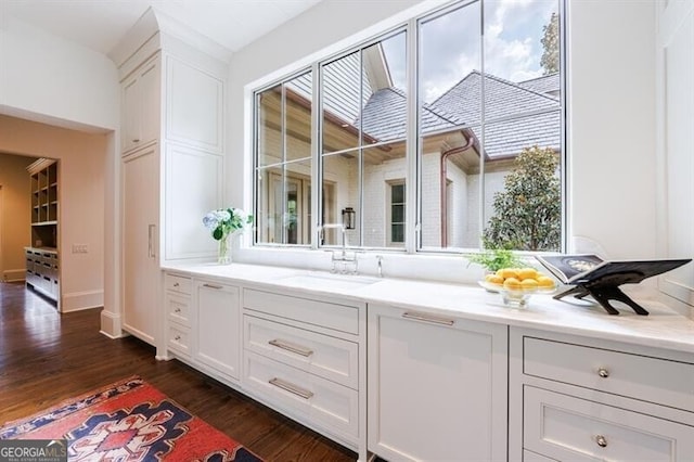 bathroom featuring vanity and hardwood / wood-style flooring