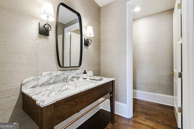 bathroom with wood-type flooring and vanity