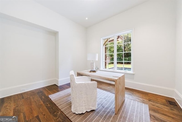 office area featuring dark wood-type flooring