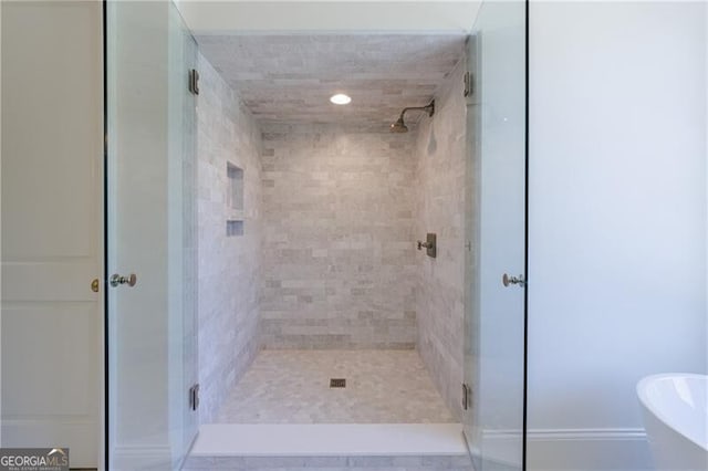 bathroom with independent shower and bath