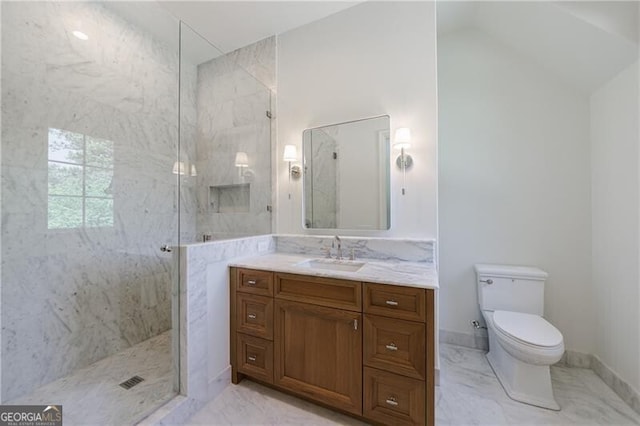 bathroom featuring a shower with shower door, toilet, vanity, and vaulted ceiling